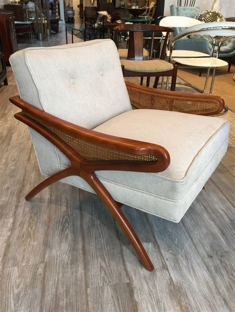 Find stylish home furnishings and decor at great prices! Mid-Century Sculptural Club Chair with Rattan Detail at 1stdibs
