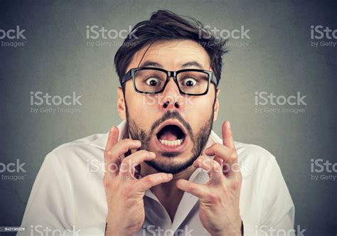 Scared Man In Panic Looking At Camera Stock Photo Download Image Now