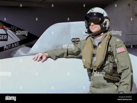 Us Navy Fighter Pilot In Full Flight Gear Standing Next To His F 18