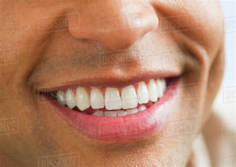 Close Up Of Mans Perfect Teeth Stock Photo Dissolve