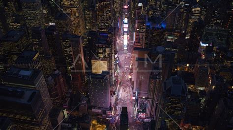 The Bright Lights Of Times Square At Night In Midtown New York City