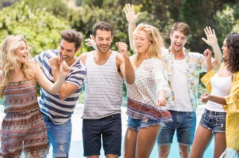 Group Of Happy Friends Dancing Near Pool Stock Image Image Of Luxury