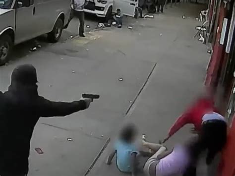 Chilling footage shows two children get caught up in New York shooting ...
