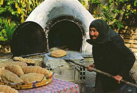 The bread will probably take 30 to 45 minutes to bake (check it for doneness after 30 minutes). a grandmother baking bread in a wood oven | Household ...