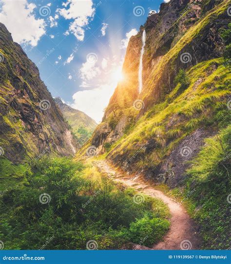 Mountains Covered Green Grass High Waterfall At Sunset Stock Image