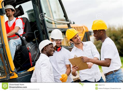 Group Of Engineers On A Construction Stock Photo - Image of project ...