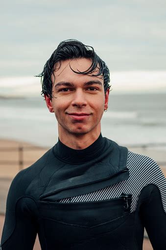 Includes dude, wing, skeg, fin key, and unsinkable surfboard. A Handsome Surfer Dude Stock Photo - Download Image Now ...