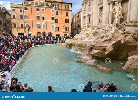 Crowd Of Tourists On Square Near Fontana Di Trevi Or Trevi Fountain In