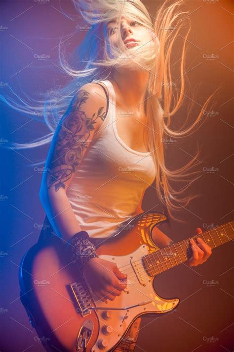 woman playing electric guitar musician photography electric guitar art guitar