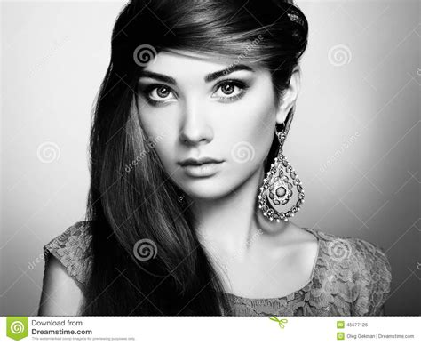 Portrait Of Beautiful Young Woman With Earring Jewelry