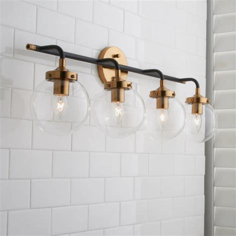 Browse a wide selection of bathroom light fixtures for sale in a variety of finishes and styles, including vanity lights and bathroom sconces. Mixed Metal Globe Vanity Light - 4 light - Shades of Light