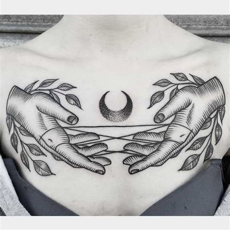 Chest Tattoos For Women Crescent Moon Hands Pulling Stings Grey Bra