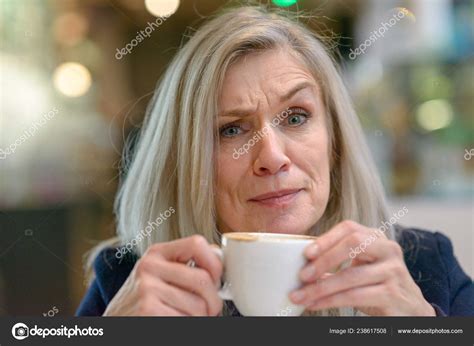 Puzzled Disbelieving Middle Aged Woman Looking Camera Sceptical Frown