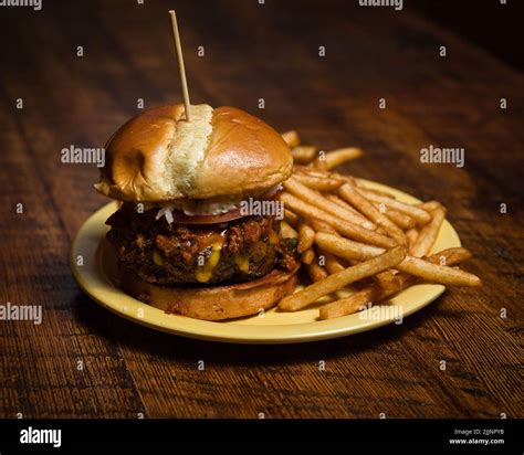 A Closeup Shot Of Burger And Fries On A Plate Stock Photo Alamy
