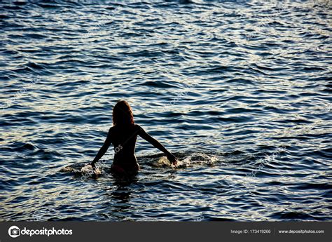 Woman Entering The Sea Stock Photo Fredpinheiro Hotmail Com Br