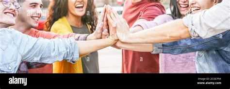 Group Of Diverse Friends Stacking Hands Outdoor Happy Young People