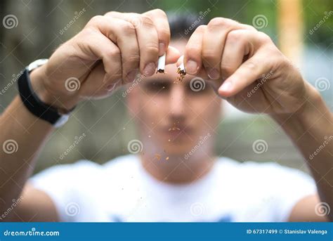 Young Attractive Man Breaking Cigarette Stock Image Image Of Healthy