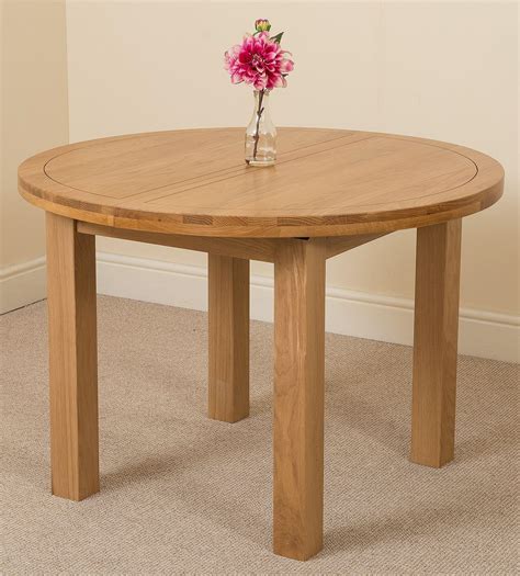 Made.com custom made niven 8 seat round dining table, concrete and smoked oak. Edmonton Oak Extending Round Dining Table | Oak Furniture King
