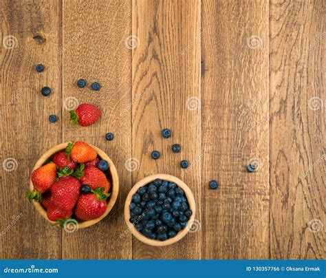 Fresh Berries On Rustic Wooden Background Top View Stock Photo Image