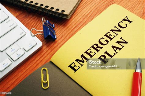Emergency Plan Or Disaster Preparedness On The Desk Stock Photo