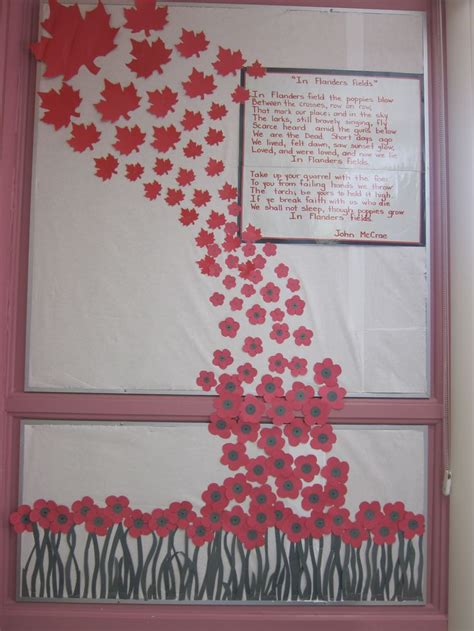 I made a sky background and created a u.s.a. Remembrance Day Bulletin Board "In Flander's Fields" | Remembrance day art, Remembrance day ...