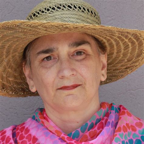 Portrait Of A Middle Aged Woman With A Straw Hat Stock Image Image Of