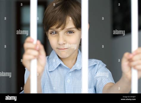 Boy Behind Bars Hi Res Stock Photography And Images Alamy