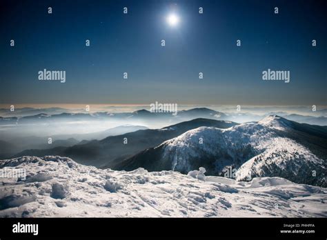 Range Of Winter Mountains At Night Stock Photo Alamy