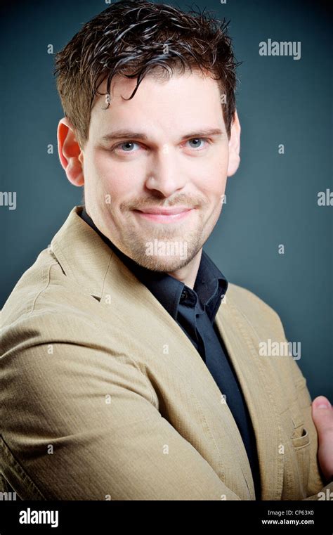Smiling And Good Looking Man In Portraits Stock Photo Alamy