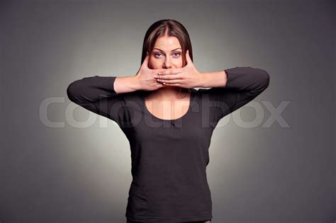 Woman Holding Hands Over Her Mouth Stock Image Colourbox