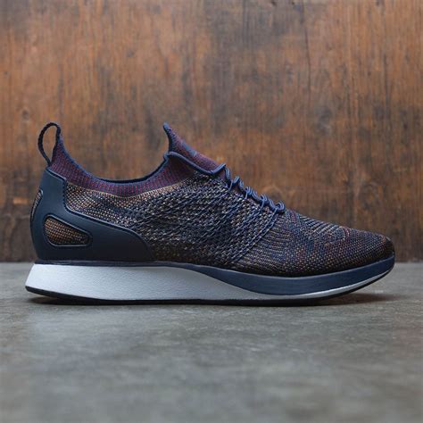 A visible zoom air cushioning unit can be seen at the bottom of the nike air zoom mariah flyknit racer running shoe surrounded by a black rubber outsole. nike men air zoom mariah flyknit racer navy college navy ...