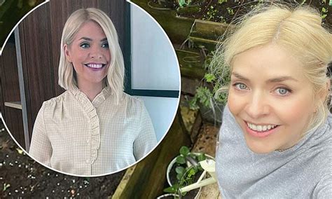 holly willoughby looks radiant as she poses while gardening