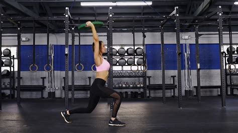 Plate Overhead Walking Lunges Youtube