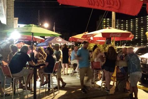 Get food and stay for the drinks and live music. Shore Dogs Grill & Food Truck | Panama City Beach, FL 32408