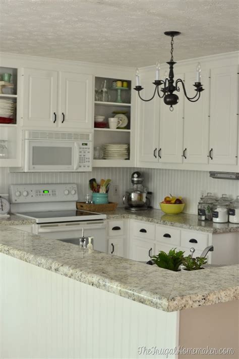 In reality, painting kitchen cabinets is a project that definitely has many potential pitfalls. How to re-paint your yucky white cabinets