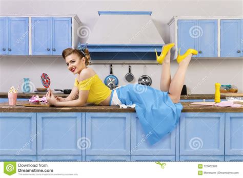 Retro Pin Up Girl Woman Lying Relaxing On Kitchen Stock Image Image