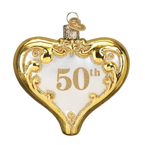 An Ornament Shaped Like A Heart With The Number 50 On It