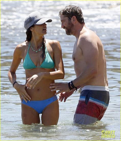 Gerard Butler Goes Shirtless While Hitting The Beach With Bikini Clad Girlfriend Morgan Brown
