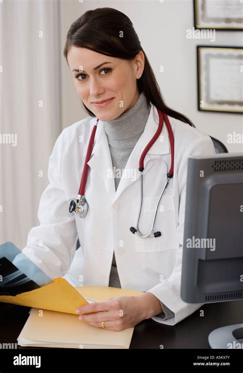 Portrait Of Female Doctor In Office Stock Photo Alamy