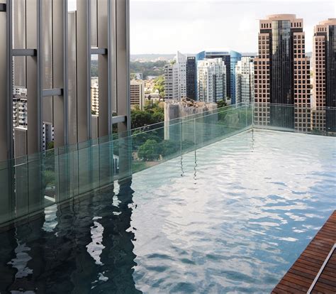 4 High Rise Condos With Balcony Pools