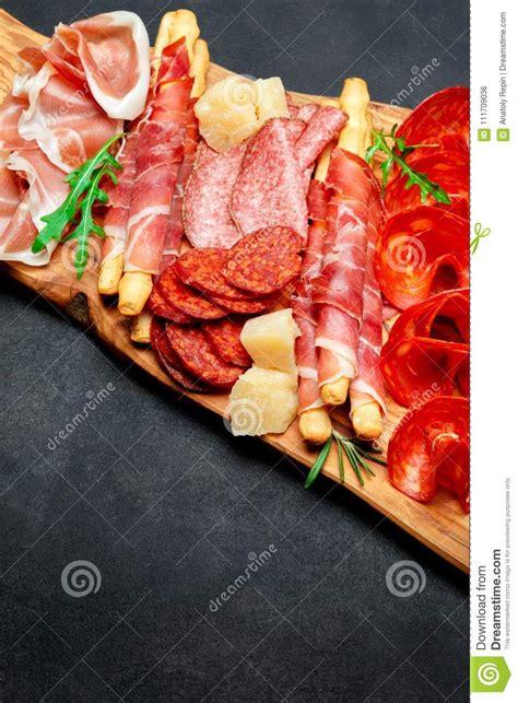 Cold Smoked Meat Plate With Pork Chops Prosciutto Salami And Bread