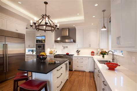 White Kitchen With Small Seating Island Traditional Kitchen
