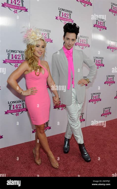 Image Distributed For Longines Tara Lipinski And Johnny Weir Pose On