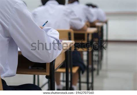 Writing Test Exam Behind Girl Asian Stock Photo Edit Now 1962707560