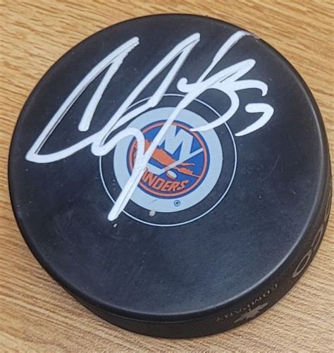 Autographed Casey Cizikas New York Islanders Hockey Puck Main Line Autographs