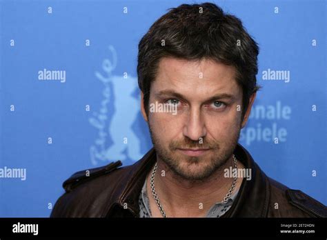 British Actor Gerard Butler Poses For The Photographers During A