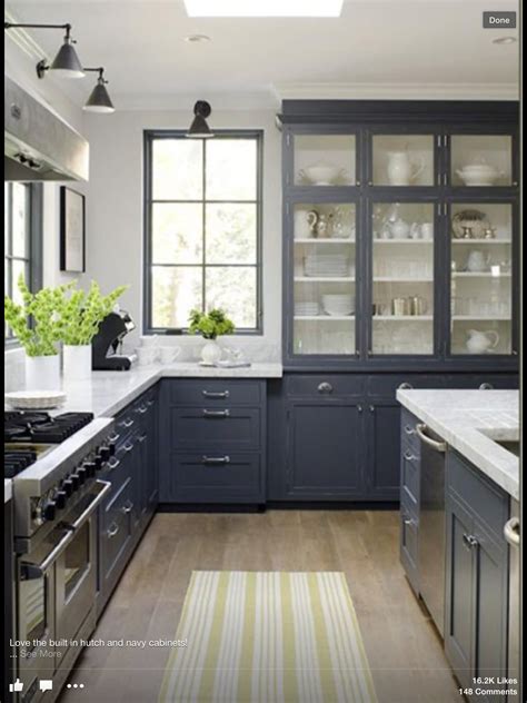 Looking for grey kitchen cabinet ideas? dark grey kitchen cabinets, white walls black window ...