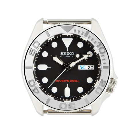 A bezel is a top ring on the watch which surrounds the crystal. SKX007 Ceramic Bezel Insert: YM style Silver | namokiMODS