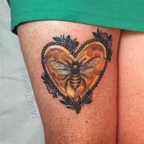 Black and grey line art tattoo of bee and honeycombs motive done by artist mr. Bee and Honeycomb Heart Tattoo | Tattoo Ideas and ...