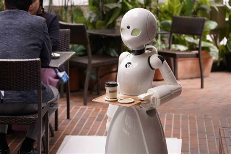 This Cafe In Japan Has Robot Waiters Controlled Remotely By Disabled